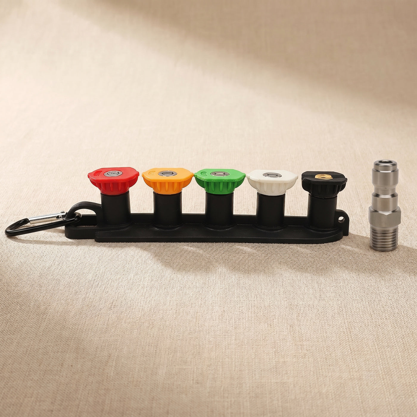 DRIVORA 5-piece quick-connect spray nozzle set on cream surface